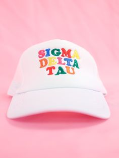 a white baseball cap with the word stigma delta tau embroidered on it in multicolored letters