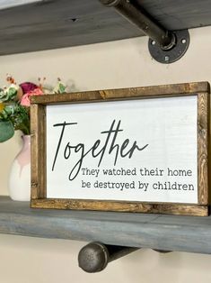 a sign that says together they watched their home be destroyed by children on a shelf