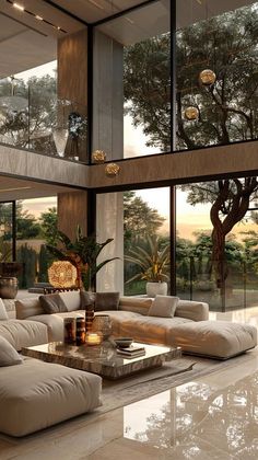 a living room filled with lots of furniture next to tall glass windows on the wall