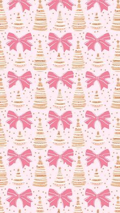 a pink and gold christmas pattern with bows