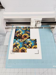 an image of sunflowers on the side of a printer