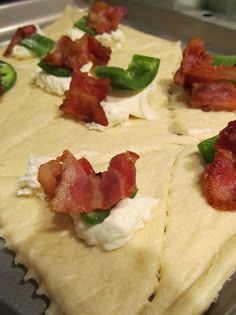 bacon, jalapeno, and cream cheese in crescent rolls = great party food