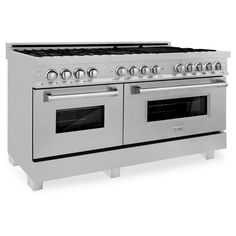 an oven with four burners and two doors on each side, in stainless steel