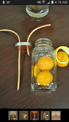 there are lemons in a mason jar on the table