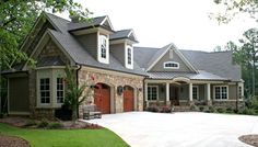 a large house with lots of windows on the front