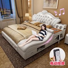 a woman laying on top of a bed in a bedroom