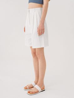 Editor's NotesThese PANDORA.FIT’s shorts are cut from durable cotton that hold its shape in a basic wide leg silhouette. They are high-waisted that make your legs slim and have two-pintuck detail at the front.- Basic wide leg silhouette- Two-pintuck detail at the front- High-waisted- DurableMeasurements(in.)S / M / L- Waist: 13.11 in. / 13.90 in. / 14.69 in.- Hip: 17.52 in. / 18.31 in. / 19.09 in.- Rise: 13.78 in. / 14.17 in. / 14.57 in.- Thigh: 12.80 in. / 13.58 in. / 14.37 in.- Leg opening: 12 Modern Bottoms With Built-in Shorts, Modern Bottoms With Built-in Shorts For Spring, High-waisted White Cotton Bermuda Shorts, White High-waisted Cotton Bermuda Shorts, White High-waisted Bermuda Shorts In Cotton, Chic Short Culottes For Summer, Chic Cotton Summer Culottes, Chic Summer Cotton Culottes, Chic Short Length Culottes For Summer