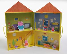 an open doll house with peppa pig inside