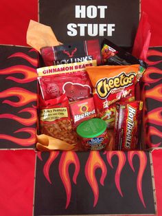 a hot stuff box filled with candy and snacks