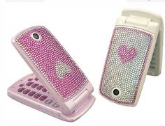 two cell phones are decorated with swarong and hearts on the front one is pink, the other is white