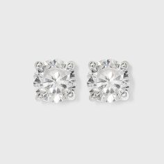 Whether you're running to yoga or heading to a formal party, complete your look with this Women's Sterling Silver Cubic Zirconia Stud Earrings from A New Day™ in Silver/Clear. Showcasing round-cut, clear cubic zirconia stones held secure in a four-prong setting, these brilliant earrings are both simple and elegant to wear. Gender: female. Age Group: adult. Pattern: Solid. Hoop Earring Sets, Expensive Jewelry, Cubic Zirconia Earrings, Yoga Session, Beaded Hoop Earrings, Formal Party, Fringe Earrings, Real Diamonds, Earring Backs