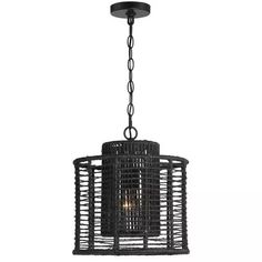 a black chandelier hanging from the ceiling with an iron cage design on it