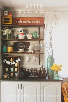 a kitchen with white cabinets and shelves filled with coffee pots, mugs, and other items