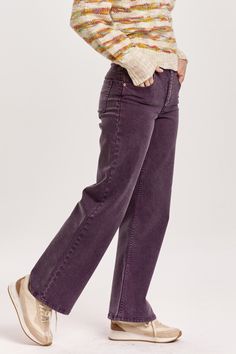 Super high rise wide hem straight leg jeans. It's the jolly fit that sits slightly lower on the waist and fitted easy & straight from the hip to mid thigh. Full inseam on stretch denim accented with wide waistband & double button closure, side seam panel inserts, washed for softness in designer color palettes, tailored center inseam press, wide hem band finish.11" Front Rise (include waistband), 19 1/2" Leg Opening, 30" inseam (Size 27) SUPER STRETCH: Plenty give, may go down one size 90% COTTON 8% POLYESTER 2% SPANDEX Machine wash cold, Tumble dry low Imported Zip fly and button closure Front & back pockets Dark Purple Jeans Outfit, Purple Wide Leg Jeans, Purple Jeans Outfit, Purple Wide Leg, Tencel Denim, Denim Essentials, Purple Jeans, Purple Plum, Acid Wash Jeans