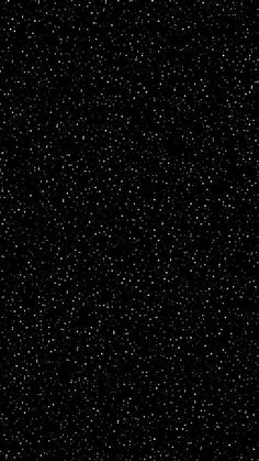 black and white photograph of stars in the night sky with no clouds or raindrops