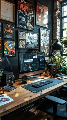 a desk with a computer and speakers on it