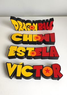 three stickers that say dragon ball, chowi est ela victoria