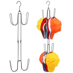 three umbrellas hanging on hooks next to each other