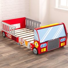 a child's bed with a firetruck design on the bottom and sides