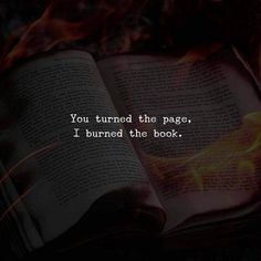 an open book with the words you turned the page, i burned the book on fire