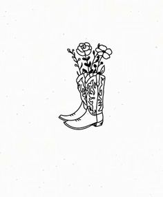 a drawing of a boot with flowers in it