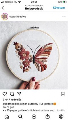 someone is showing off their embroidery work