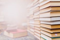 a stack of books sitting on top of each other