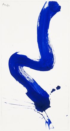 an abstract painting with blue paint on white paper