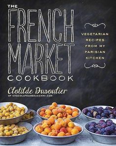 the french market cookbook contains several different types of food in bowls and pans