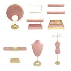 a collection of pink and gold items on display in different shapes, sizes and colors