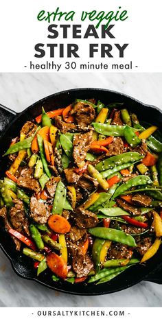 steak stir fry in a skillet with vegetables on the side and text overlay