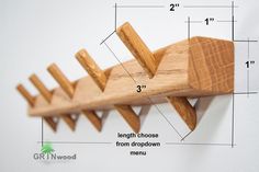 a wooden coat rack is shown with measurements for the top and bottom pieces on it