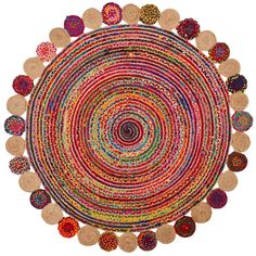 a round rug with many different colored circles on it