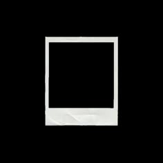 an empty white photo frame on a black background