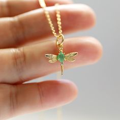 The dragonfly necklace is made of Cats eye green stone gold dragonfly pendants and a skinny gold-plated brass chain. Soft and simple. Great for gift , everyday or special occasions.  Your item will ship in a gift box. Please feel free to contact me if you have any questions. ♥ Length  14" - 20" ♥ Pendant Approx. 5/8" x 7/8" ♥ Gold plated over brass / Cats eye green stone / Cubic Zirconia ♥ Delivery Time Fast shipping within 1 - 3 days  ♥  See more Rudiana Accessories  Rudiana.etsy.com Green Dragonfly Jewelry As A Gift, Yellow Gold Dragonfly Jewelry For Gifts, Handmade Gold Dragonfly Jewelry, Handmade Dragonfly Necklace For Gift, Gold Dragonfly Necklace For Gift, Green Dragonfly Jewelry For Gifts, Adjustable Dragonfly Necklace For Gift, Green Dragonfly Jewelry Gift, Elegant Green Dragonfly Shaped Jewelry