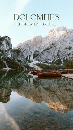 an image of a boat on the water with mountains in the background and text that reads dolmites elopement guide