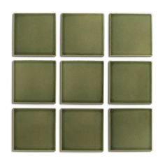 six square green glass tiles on a white background