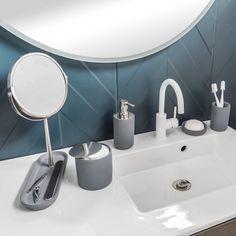 a bathroom sink with soap dispenser, toothbrush holder, and mirror