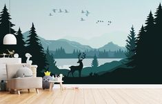 a living room with a deer mural on the wall and a chair in front of it