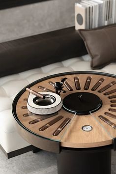 a coffee table that has a clock on it