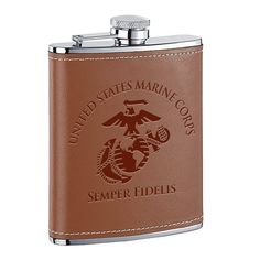 a brown leather flask with the marine emblem on it