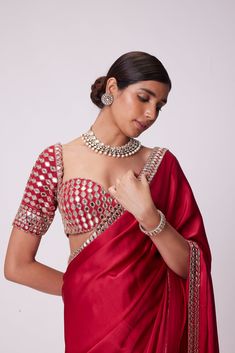 Crimson Red Satin Saree Clubbed with Real Hand Cut Mirror Embroidered Elbow Sleeve Length Blouse.From Vvani Vats Jugmug's collection.DELIVERY TIMEPlease allow 8-12 weeks for your outfit to arrive.FABRIC DETAILSSaree - SatinBlouse - GeorgetteProfessional cleaning only. Red Satin Saree, Satin Sari, Mirror Work Saree Blouse, Mirror Saree, Mirror Work Border, Red Blouse Design, Modern Blouse Designs, Red Saree Blouse, Mirror Blouse