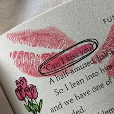 an open book with lipstick drawn on it and the words can i kiss you?