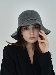 Editor's NotesBucket hat with a solid wool texture. It is an item that can be worn every day with proper width of the brim. - Solid and warm texture- Complete your feminine style- Wearable as an everyday basic item  Measurement (inch)22.4-23.2in Composition & Care- 100% Wool- Dry cleaning- Do not iron-Do not bleach Designer- by MAD FACTORY Winter Brimmed Felt Hat, Winter Wool Cloche Hat, Winter Wool Cloche Felt Hat, Classic Solid Color Cloche Hat For Fall, Winter Felt Brimmed Cloche Hat, Winter Felt Cloche Hat With Brim, Classic Solid Cloche Hat For Fall, Wide Brim Wool Fedora For Winter, Brimmed Felt Cloche Hat For Winter