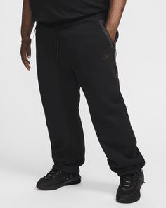 These pants bring the clean aesthetic of Tech with a roomy fit for a relaxed vibe. Our premium, lightweight fleece–smooth both inside and out–gives you plenty of warmth without adding bulk. Shown: Black/Black Style: HJ6533-010 Clean Aesthetic, How To Hem Pants, Nike Tech, Mens Fleece, Black Style, Black Fashion, Nike, Pants, Black