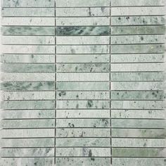 a white and green marble tile wall