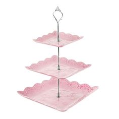 three tiered serving trays with hearts on the top and bottom, each in pink