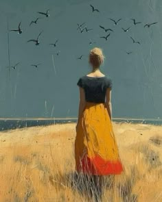 a painting of a woman in a yellow dress looking at birds flying over her head