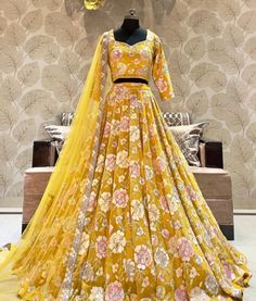 Made to Order/Measurement/Custom Order Lehenga - Color : Yellow - Fabric : Embroidered Georgette  - Fully flared paneled lehenga -   Attached  Dupatta with Blouse - Drawstring closure with Tassels - - It can be customize in any design or size  PLEASE NOTE: BUYERS ARE RESPONSIBLE FOR ANY CUSTOMS AND IMPORT TAXES THAT MAY APPLY. This is a made to order product. If you opt for 'Made To Measurement Option', we will provide a measurement template and you can share the measurements likewise. If you want to opt for 'Standard Size', Please refer to the size chart provided in the listing. Shipping: Standard Shipping is done by DHL ecommerce and it mostly takes 2 to 3 weeks to deliver after dispatch. Express Shipping is done by DHL express and it mostly delivers within a week after dispatch. Fabric Semi-stitched Yellow Traditional Wear With Resham Embroidery, Yellow Embroidered Anarkali Set For Diwali, Festive Yellow Choli With Zari Work, Yellow Embroidered Fabric With Zari Work For Festive, Fitted Yellow Anarkali Set For Reception, Yellow Choli With Zari Work In Traditional Drape, Designer Yellow Anarkali Set With Intricate Embroidery, Unstitched Yellow Sets With Zari Work, Unstitched Yellow Zari Work Sets