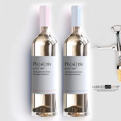 two bottles of wine sitting next to each other on a white background with a corkscrew